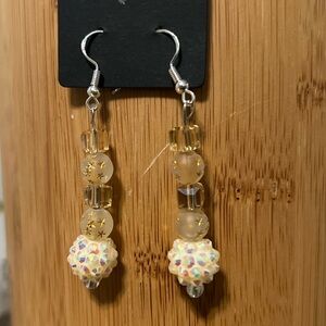 Elegant Gold and Cream Dangle Earrings